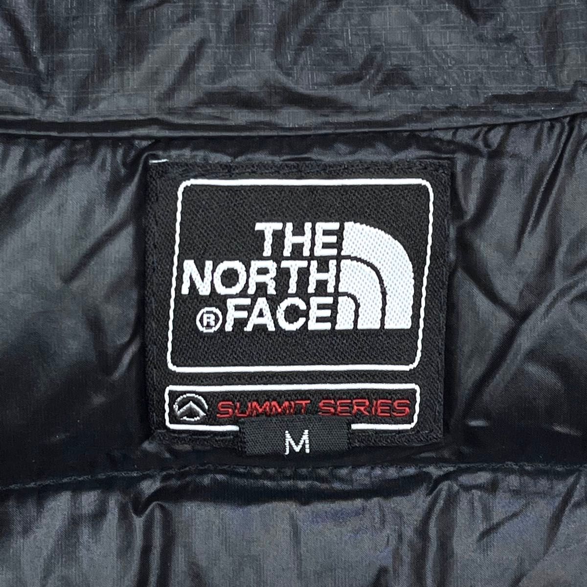 美品人気 ノースフェイス ライトダウンジャケット レディースM サミットシリーズ THE NORTH FACE ロゴ刺繍 ブラック