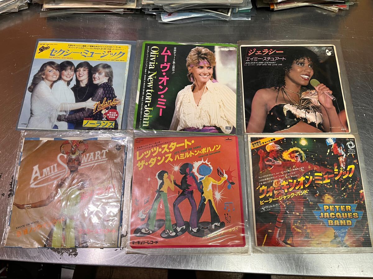 EP record approximately 300 sheets artist genre sama . record used Japanese music western-style music Beatles venturess z... beautiful Nakamori Akina artist sama .