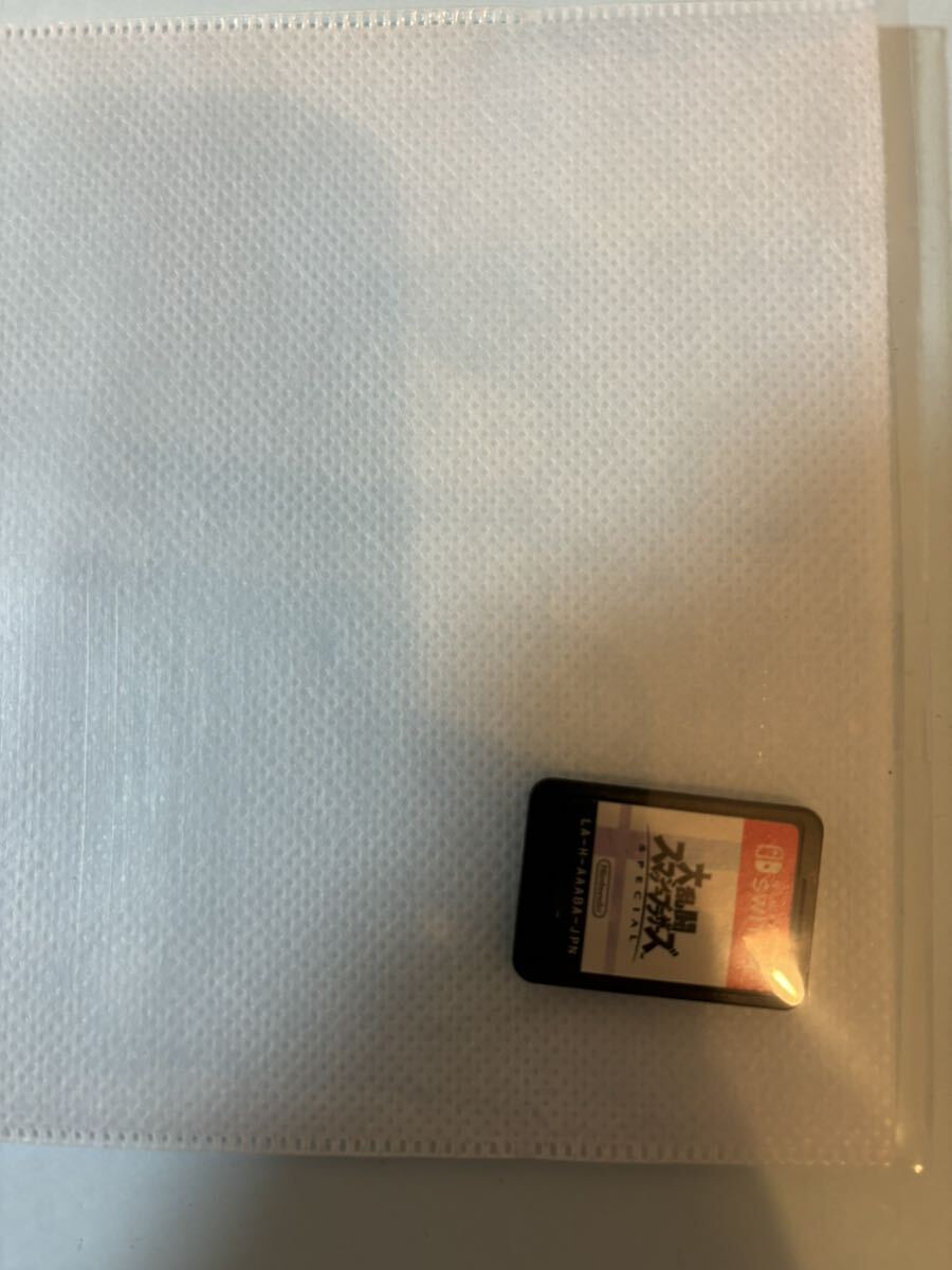 Nintendo switch有機ELモデル マリオレッド 新品未開封品 3年保証付き 新品MicroSD64GB 等 中古 大乱闘スマッシュブラザーズ付きの画像4