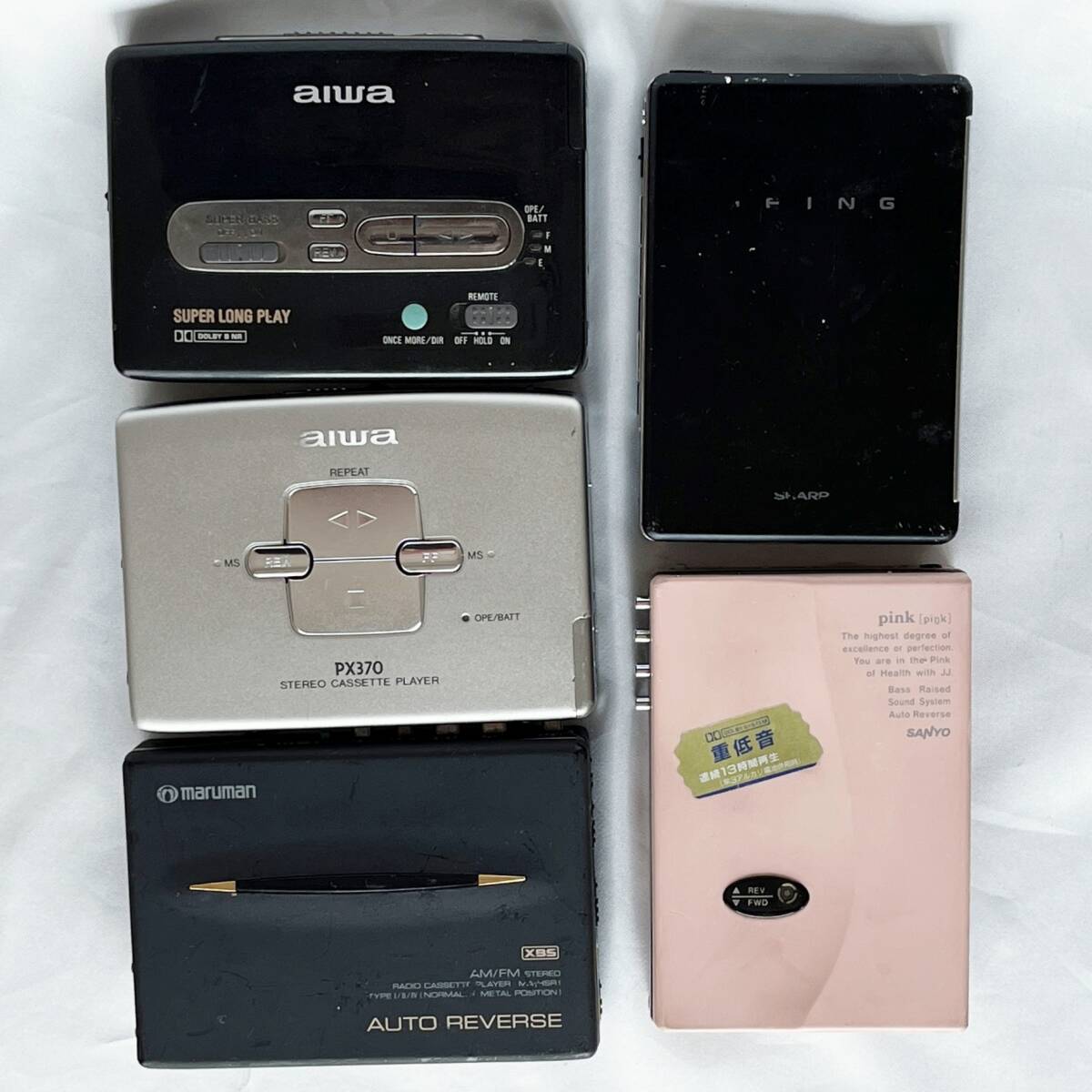 【ジャンク品】カセット ウォークマン 5台 まとめ aiwa PX-500　PX370　SANYO JJ Pink SHARP BEING JC-K50 MARUMAN カセット ソニー_画像1