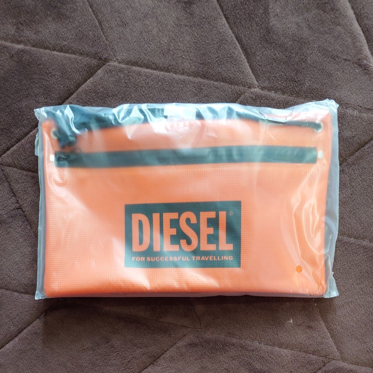 ディーゼル　DIESEL　ポーチ　ミニサコッシュバッグ　ミニバッグ　オレンジ　ノベルティ　限定品