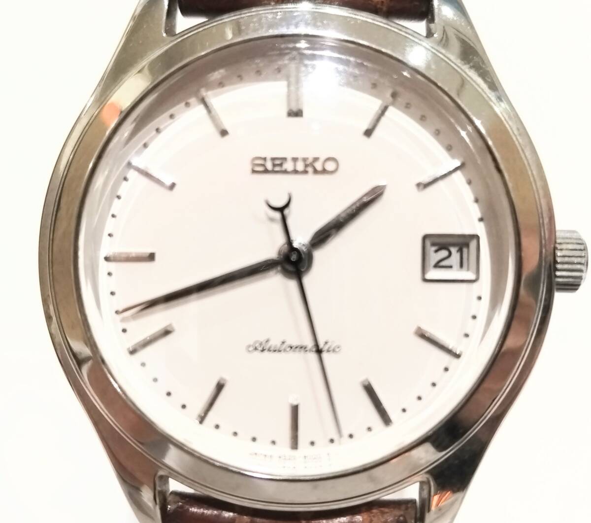 (SM1545) 【稼働品】 SEIKO セイコー 4S35-8000 cal.4S35A 裏スケ 25石 白文字盤 純正ベルト 自動巻き AT デイト 上代11万円 メンズ 腕時計_画像1