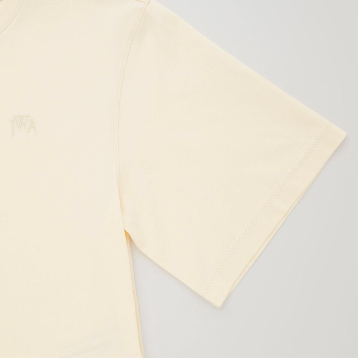 ユニクロ【未使用】フレアヘムTシャツ  コットン　半袖　オフホワイト Mサイズ　クルーネック