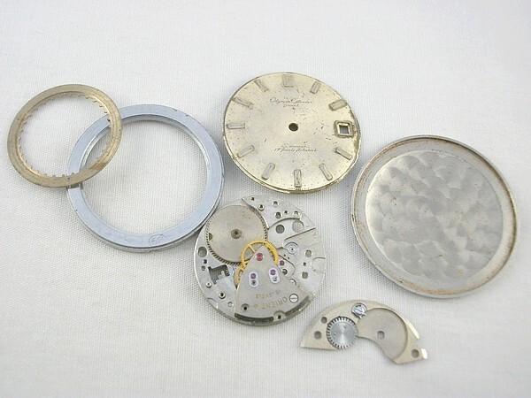 k13u23★ジャンク ORIENT 古い腕時計 機械時計 部品パーツ オリンピアカレンダー_画像1