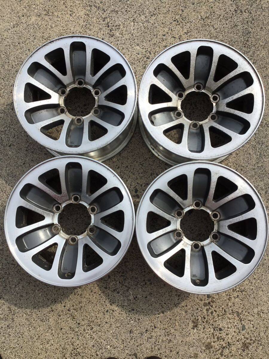 MITSUBISHI 三菱 パジェロ純正アルミホイール 15×7J+10 139.7-6H 中古品4本_画像1