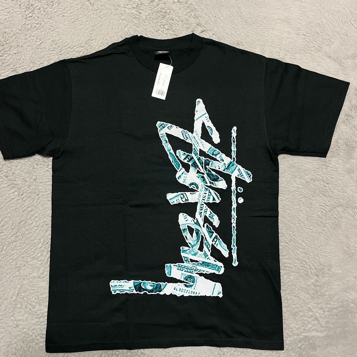 新品未使用　STUSSY Cash Stock tee tシャツ 黒　ブラック　M ドル_画像1