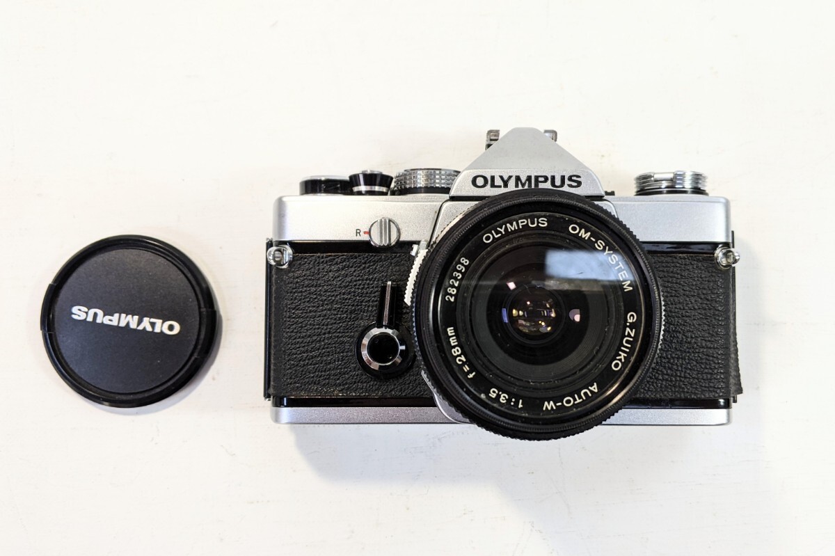 フィルムカメラ オリンパスOM1 28mm 3.5 ワイドレンズ付き　一眼レフカメラ_画像1