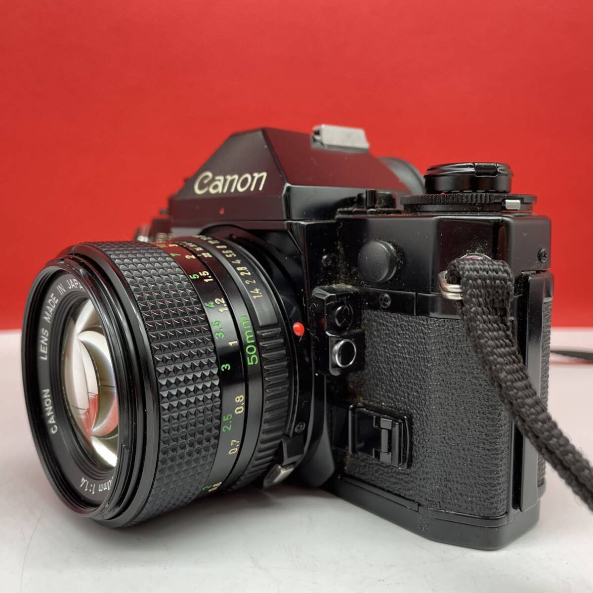 □ Canon A-1 ボディ フィルムカメラ 一眼レフカメラ New FD 50mm F1.4 レンズ 動作確認済 シャッターOK 現状品 キャノン_画像4
