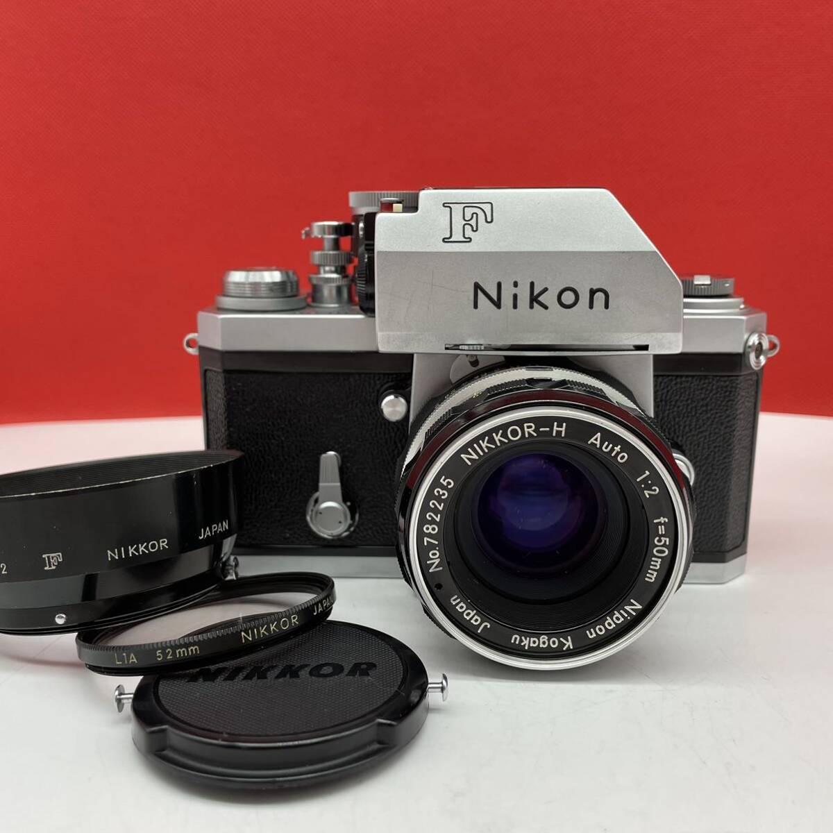 □ Nikon F フォトミックTN ボディ NIKKOR-H Auto 50mm F2 レンズ フィルムカメラ 一眼レフカメラ 動作確認済 現状品 ニコンの画像1