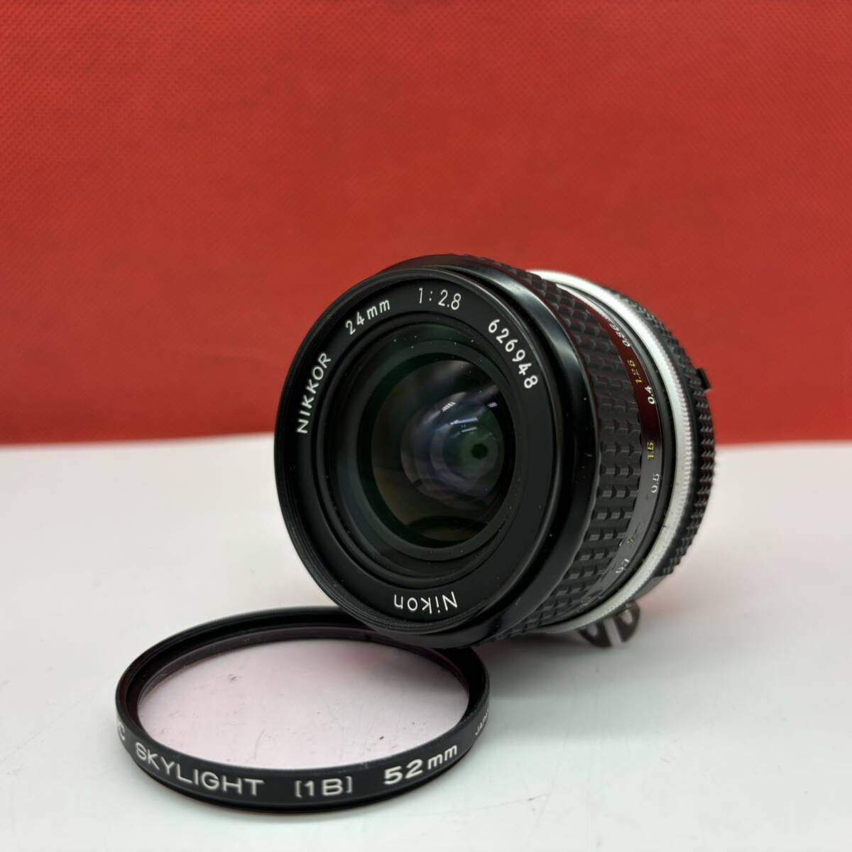 * Nikon NIKKOR 24mm F2.8 Ai camera lens single burnt point manual focus Nikon 