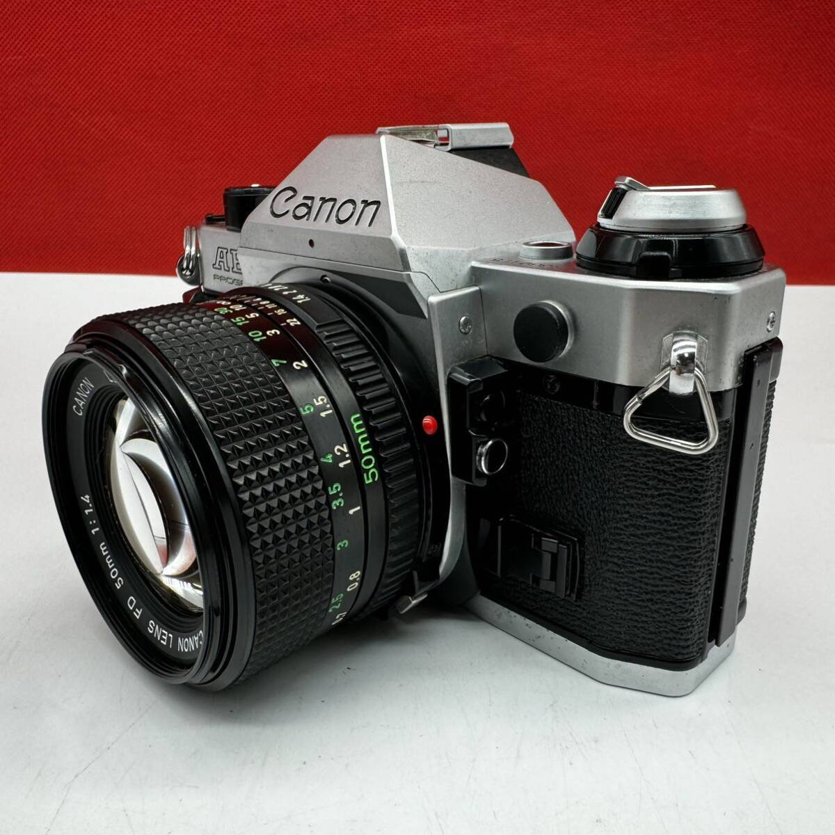 ▲ Canon AE-1 PROGRAMボディ Canon LENS FD 50㎜ 1:1.4 一眼レフ フィルムカメラ 動作未確認 ジャンク キャノンの画像4