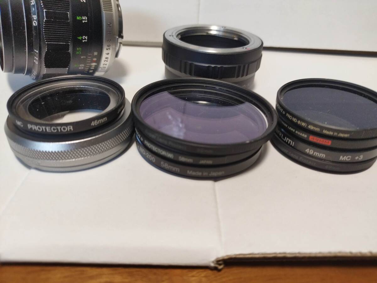 MINOLTA MC ROKKOR-PG 1:1.2 f=58mm.for MD-NEX. filter set Yupack including carriage anonymity delivery 
