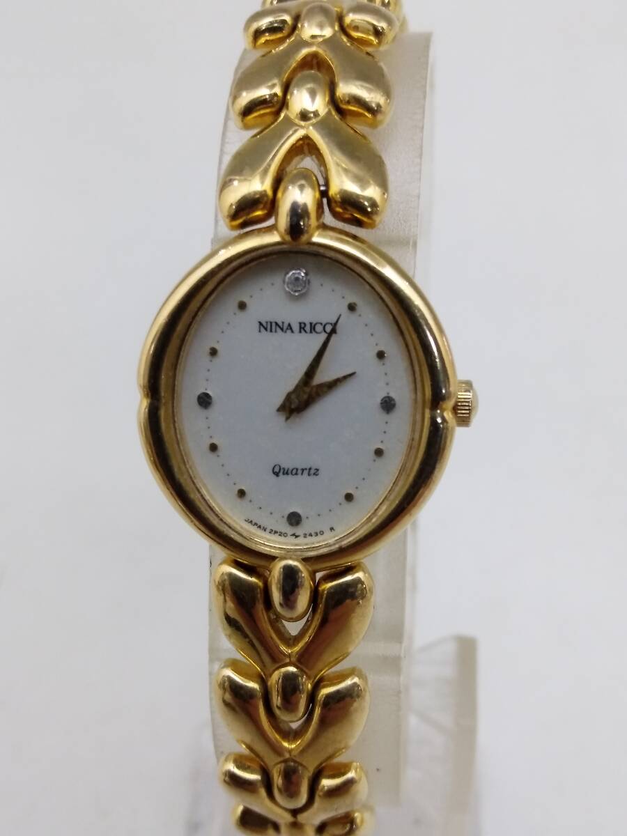 中古☆NINA RICCI ニナリッチ 2P20-6190 クォーツ QZ 2針 楕円 アナログ 腕時計 ゴールド系文字盤ストーン付き 純正ベルトの画像5