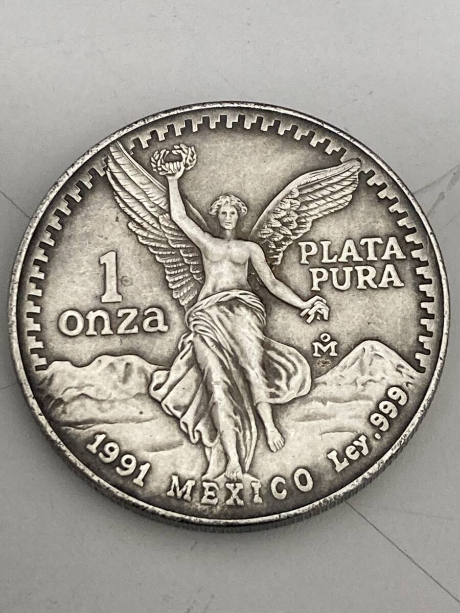 【♯6667】メキシコ大型銀貨　1オンス　純銀　直径36ｍｍ　1991年銘　要真贋確認_画像1