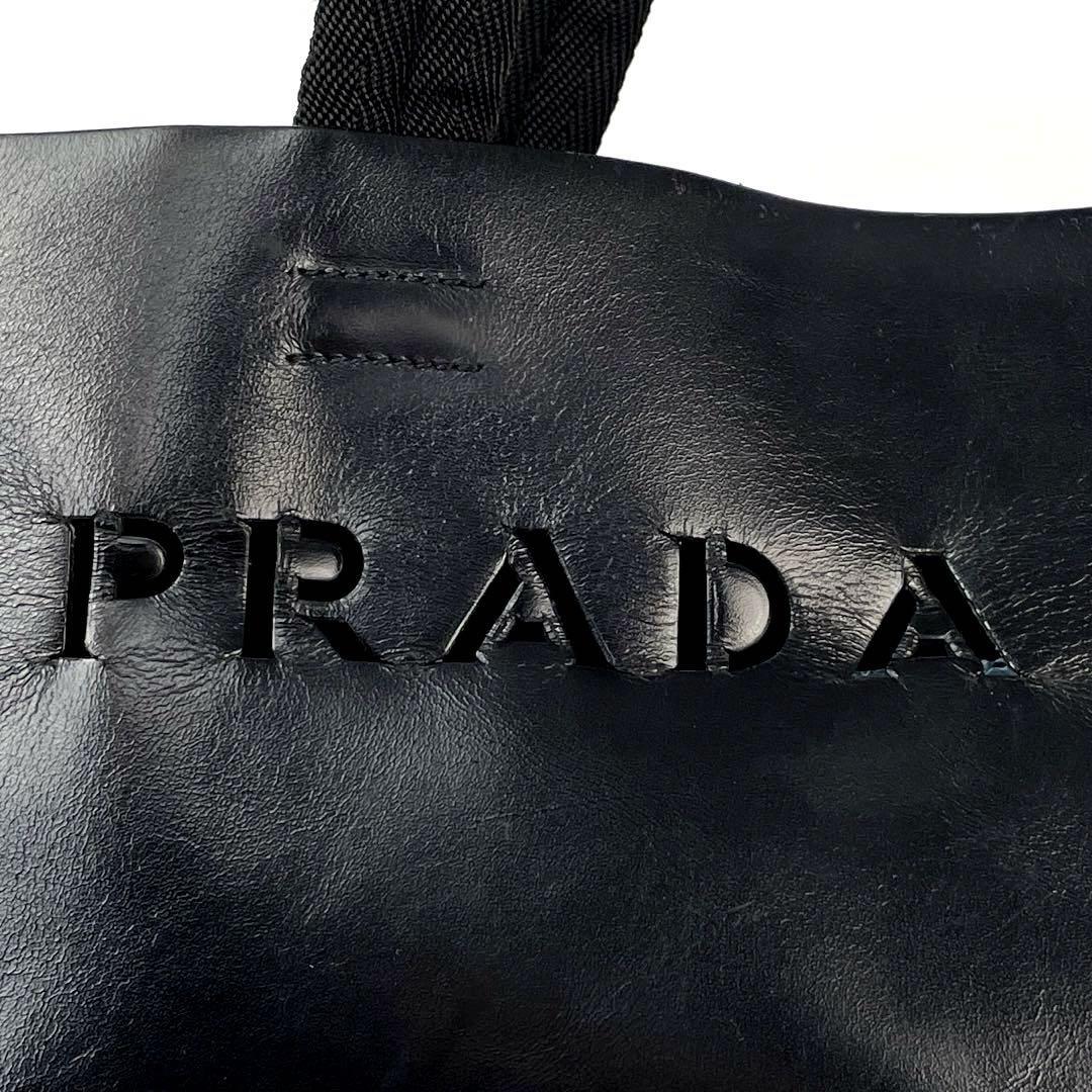 【人気】PRADA プラダ ハンドバッグ ロゴ型押し パンチング 型抜き ミニ トートバッグ 白タグ レザー 黒 ブラック 男女兼用 フォーマル