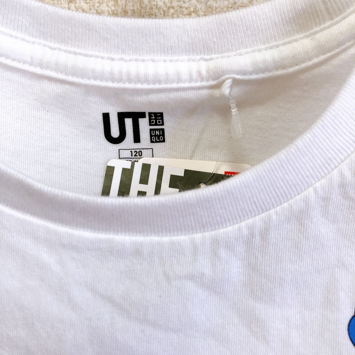 新品　未使用品　UNIQLO Tシャツ ホワイト 半袖Tシャツ ロゴ 白 半袖　ペッツ　サイズ120 キッズ　子供服　半そで　タグ