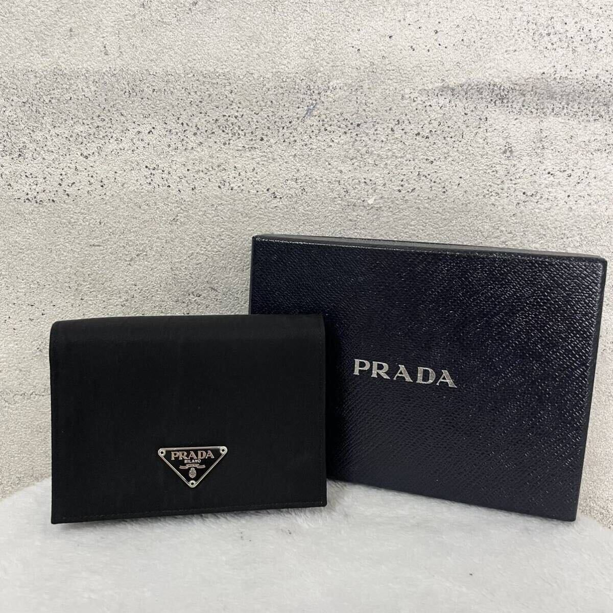 【贅沢品の極み】PRADA プラダ 折り財布 カードケース コインケース 三角プレート ナイロン 本革 レザー サフィアーノ ブラックの画像1