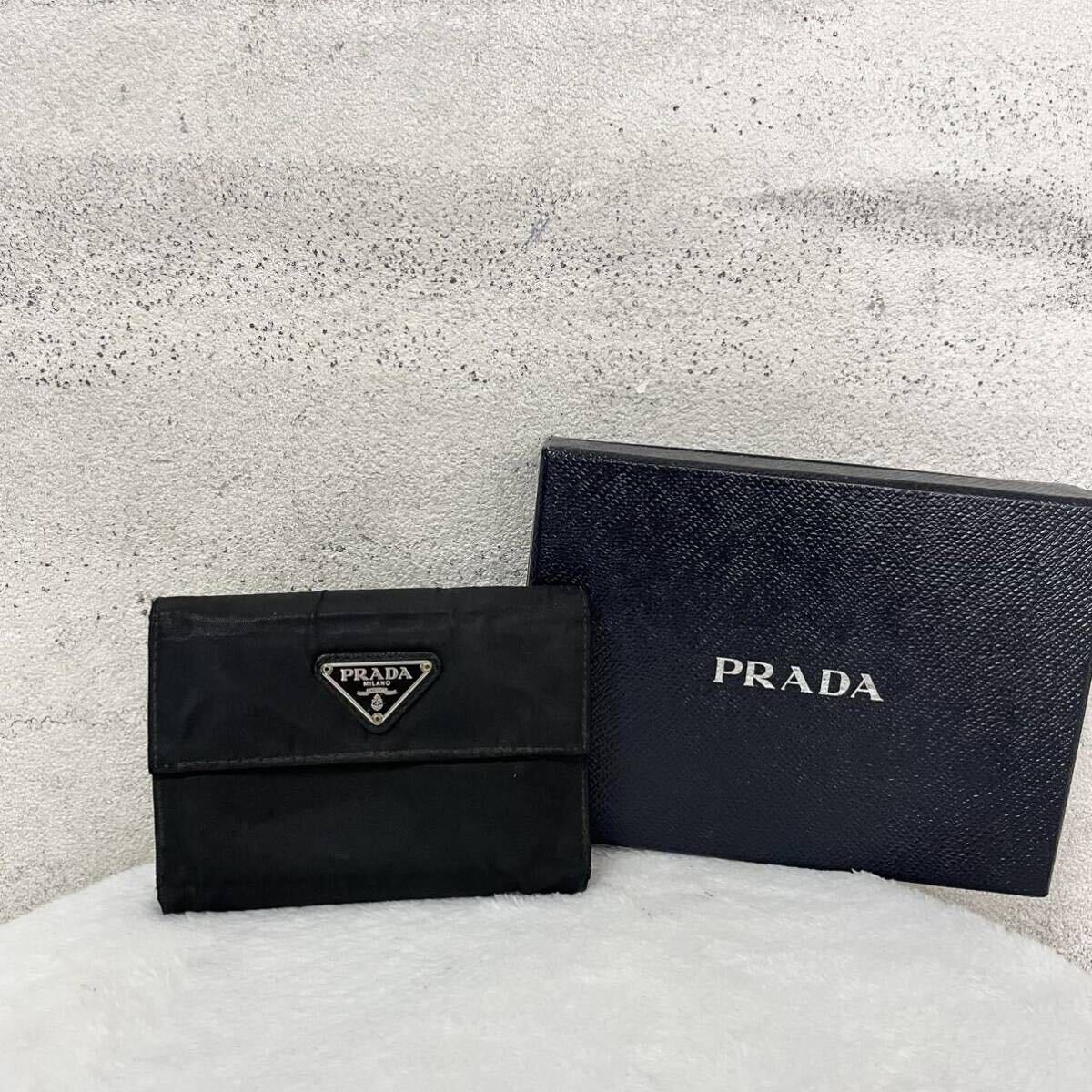 【贅沢品の極み】PRADA プラダ 折り財布 カードケース コインケース 三角プレート ナイロン 本革 レザー サフィアーノ ブラック の画像1