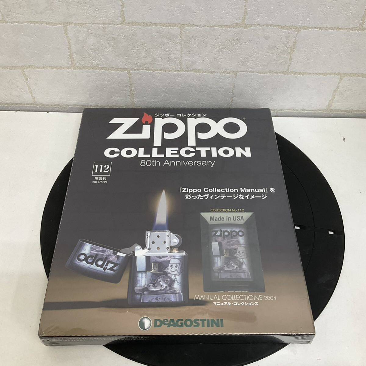 T421 4 未使用　シュリンク付　ジッポーコレクション No.112 ディアゴスティーニ　Zippo 2004　マニュアル・コレクションズ　ジッポー_画像1