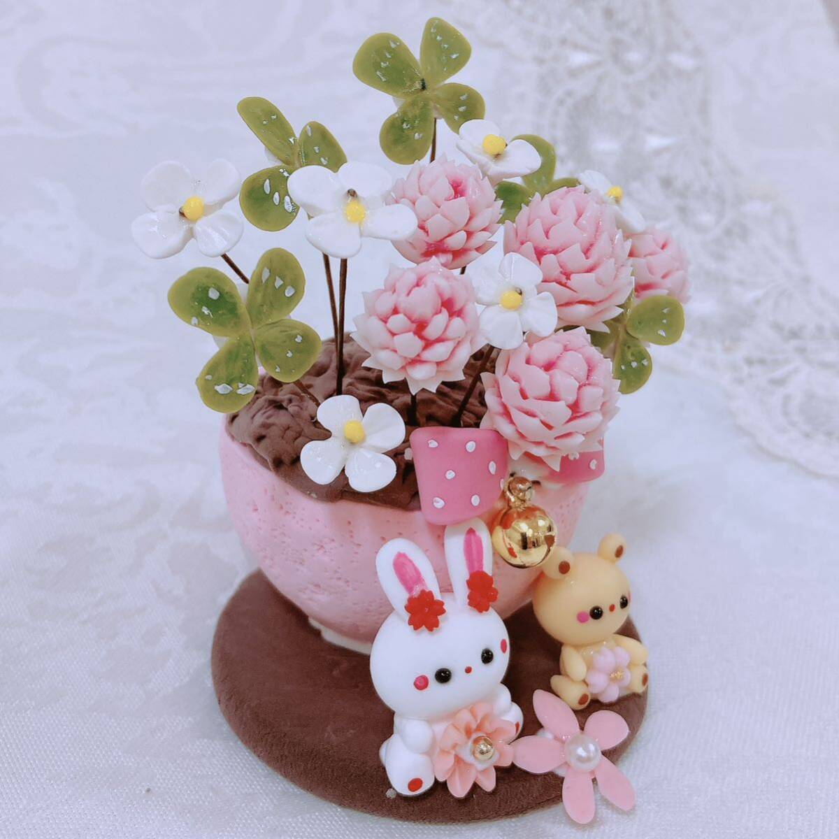 ... ... Chan * resin clay * clay ** present * pink. white tab ksa* ornament * clover 