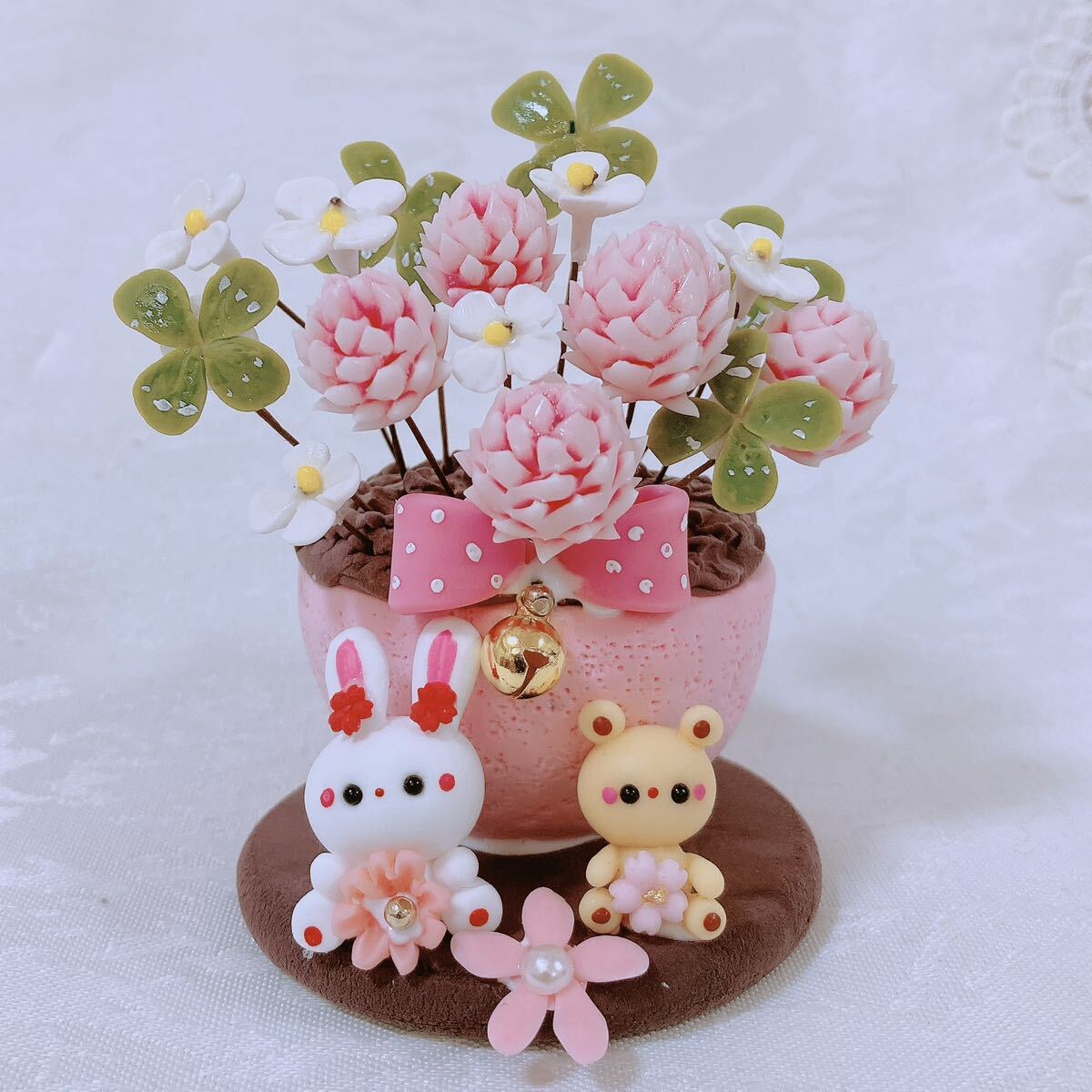 ... ... Chan * resin clay * clay ** present * pink. white tab ksa* ornament * clover 