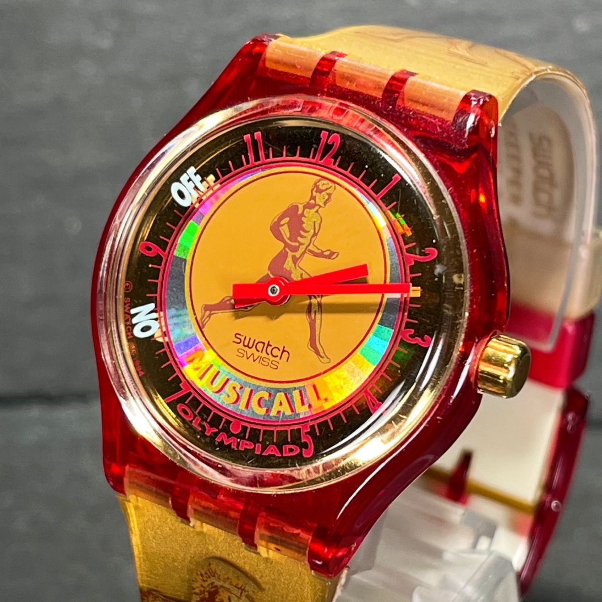  сувенир SWATCH Swatch MUSICALL мюзикл DOLICHOSdo Rico sAG1994 SLZ102 наручные часы аналог кварц Gold новый товар батарейка заменена 