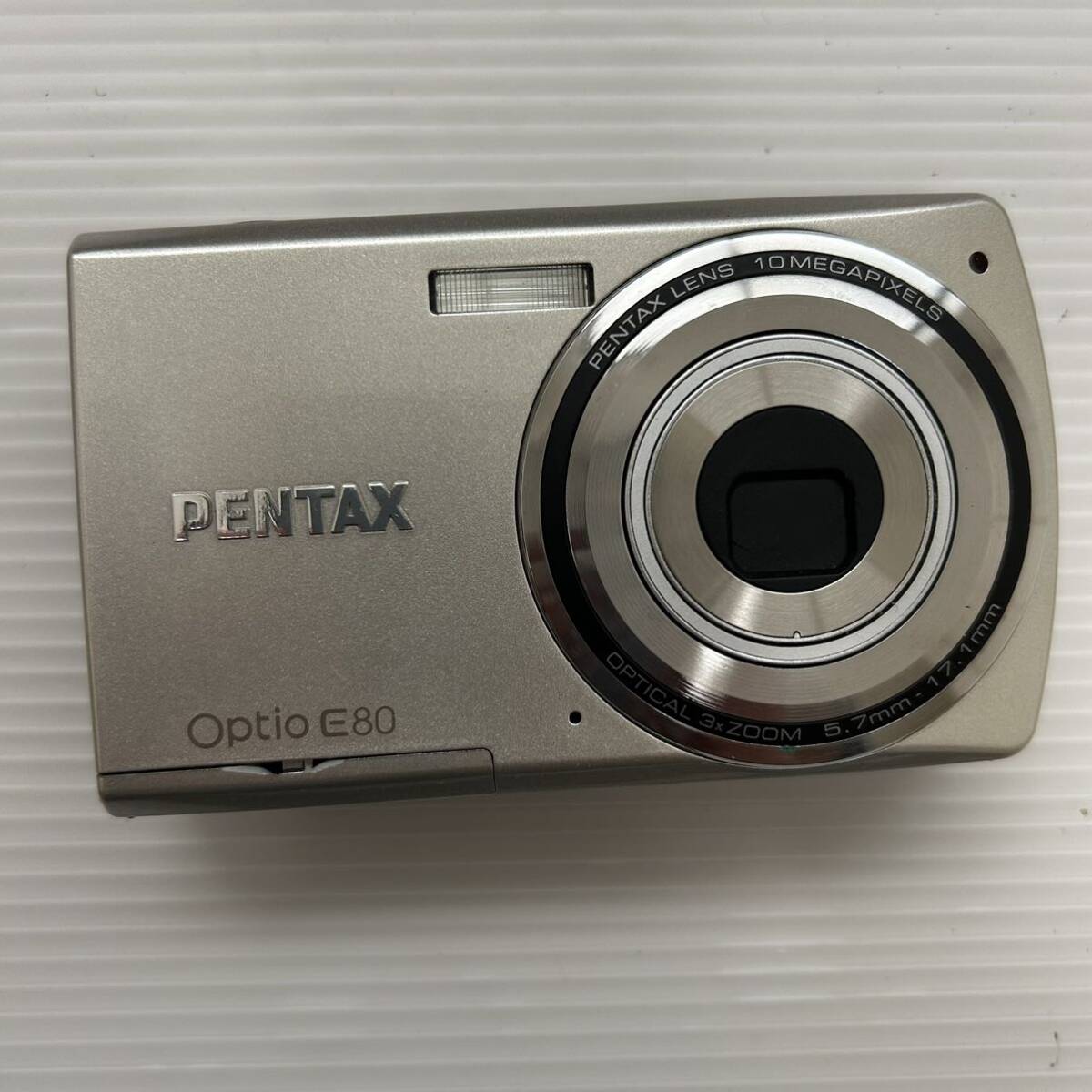 1円~ デジカメ PENTAX Optio E80 PENTAX OPTICAL 3x ZOOM 5.7mm-17.1mm空シャッター切れます SDカードなし(ジャンク品 通電確認済み HM)の画像3