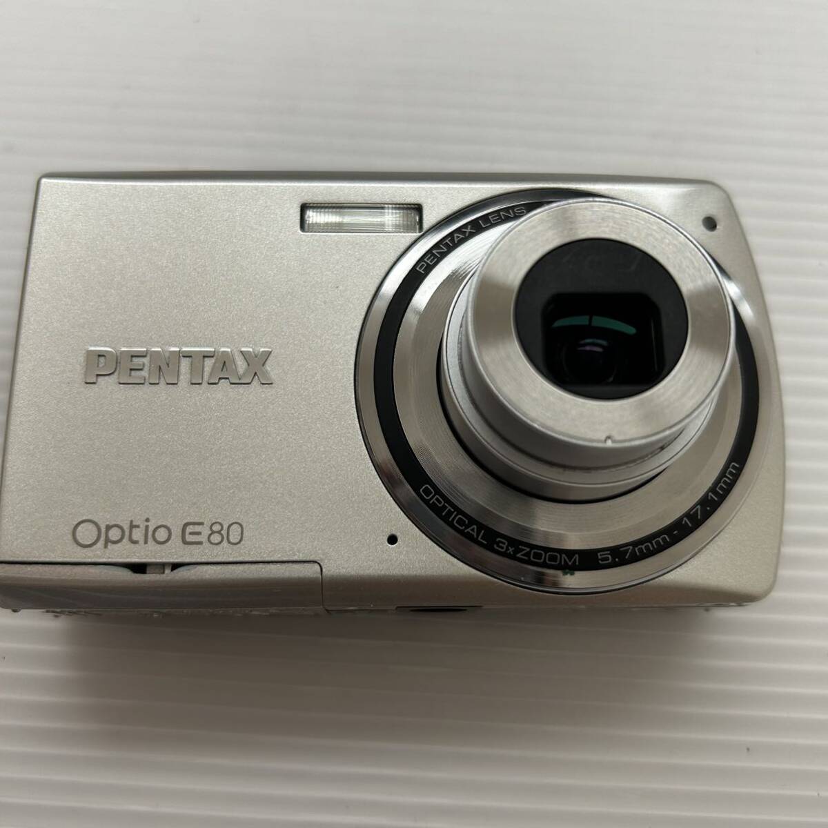 1円~ デジカメ PENTAX Optio E80 PENTAX OPTICAL 3x ZOOM 5.7mm-17.1mm空シャッター切れます SDカードなし(ジャンク品 通電確認済み HM)の画像7