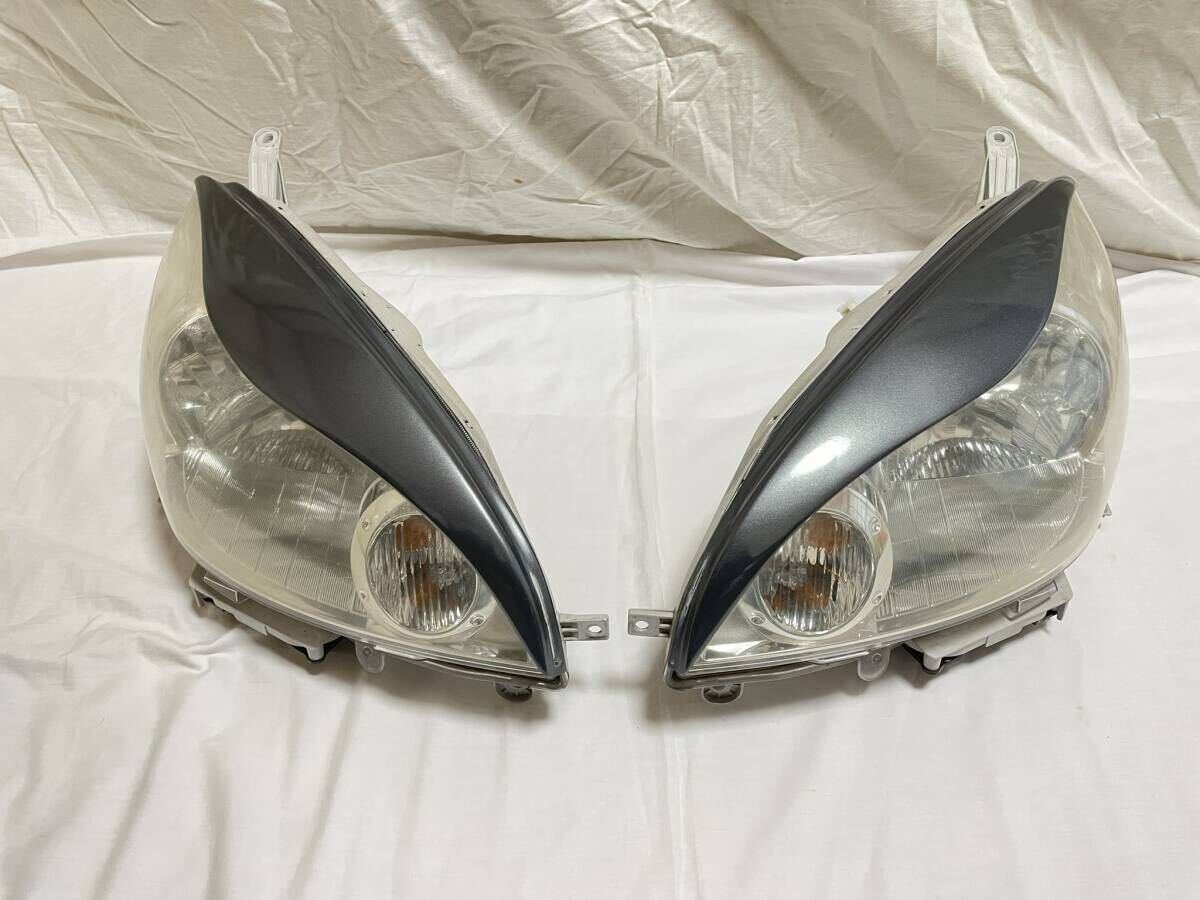 ダイハツ ソニカ ヘッドライト 左右 アイライン付き L405S L415Sの画像1