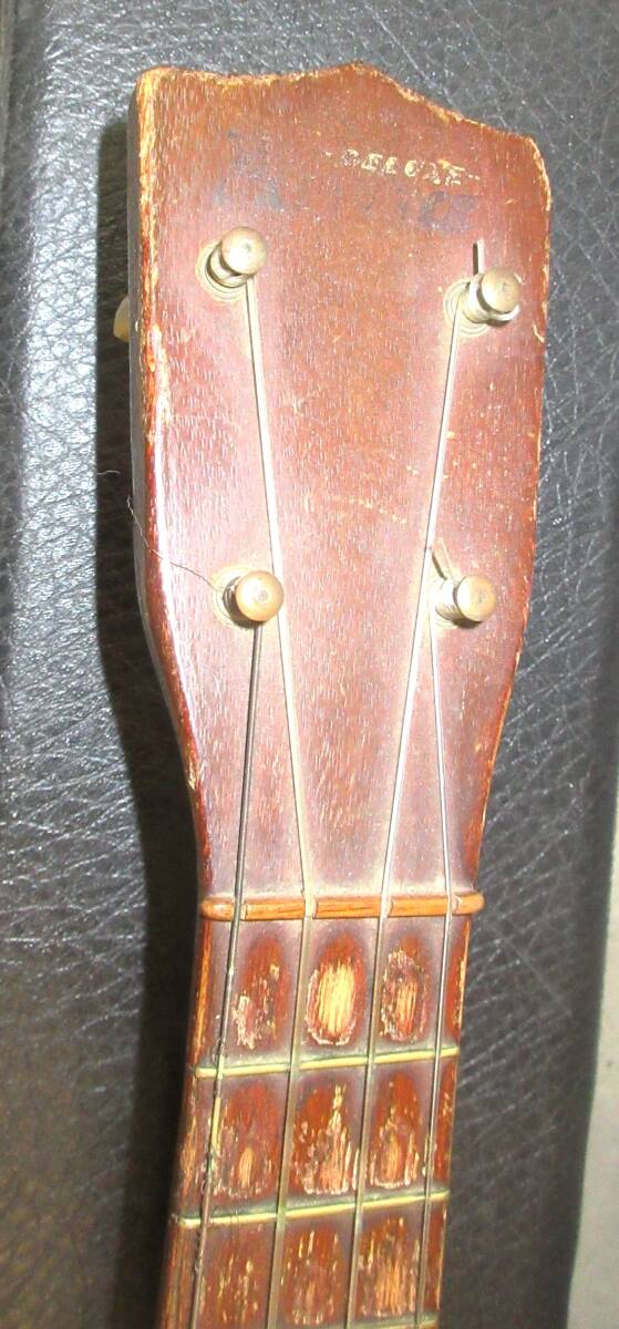  banjo ukulele total length 550. Junk!!