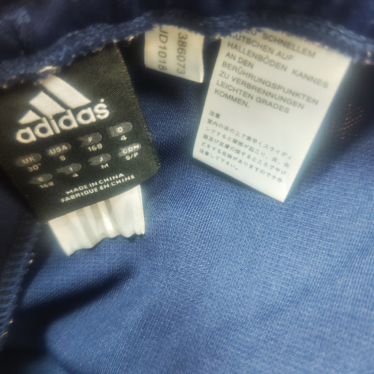 adidas Adidas джерси верх и низ в комплекте M размер темно-синий × orange спортивная куртка брюки выставить задний Logo te Caro go