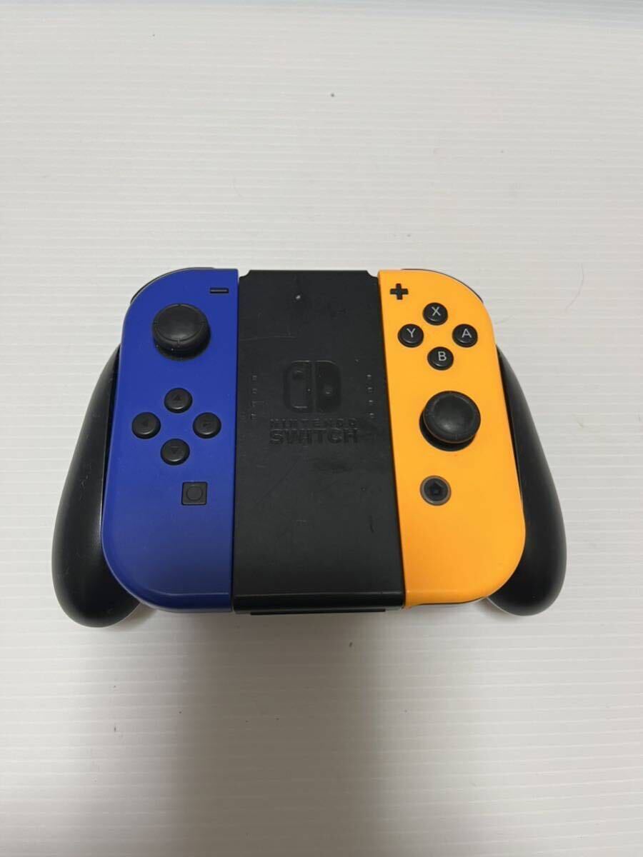 任天堂★Nintendo Switch★ジョイコン・グリップ充電・ニンテンドースイッチ★中古品動作確認済_画像1