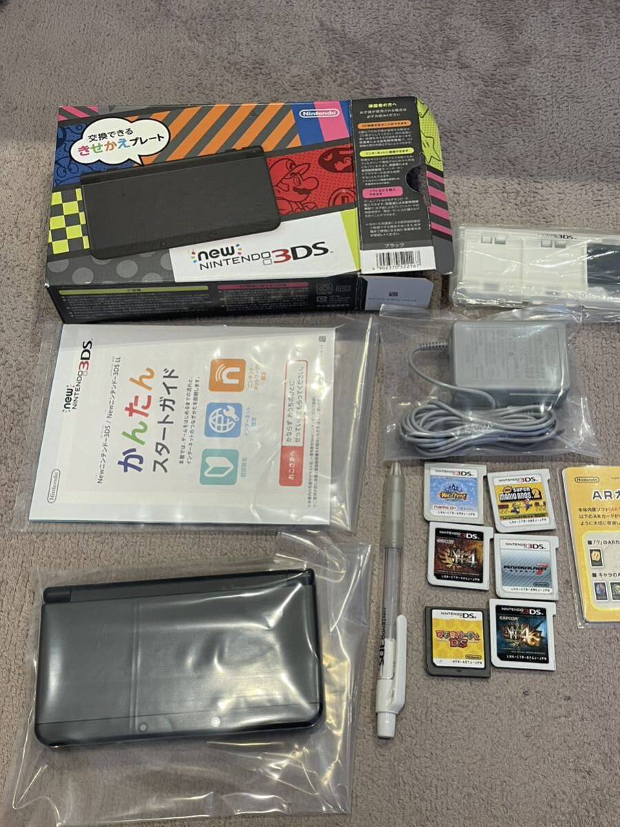中古品 結構美品です 動作確認済 任天堂 Nintendo Newニンテンドー3DS ブラック KTR-001 オマケ ACアダプタ 3DS用ソフト5本 DSソフト1本の画像1