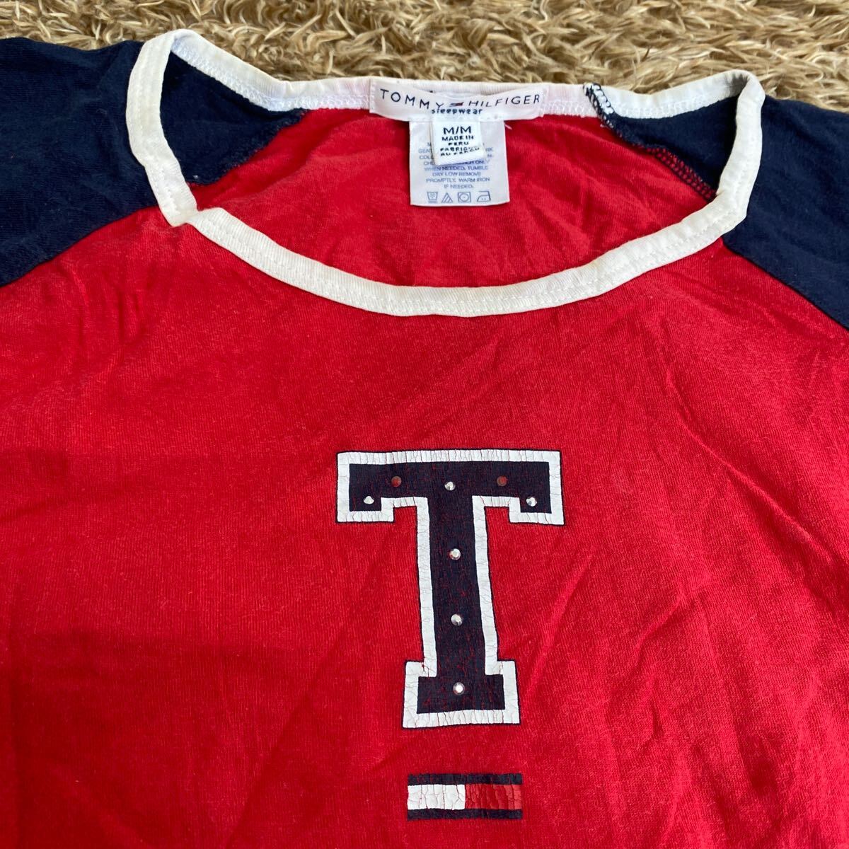 t77 tommy hilfiger length . T-shirt size M inscription pe Roo made 