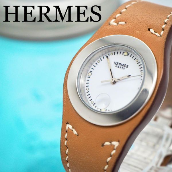 79[OH ending ]HERMES Hermes clock a-ne lady's wristwatch Brown 