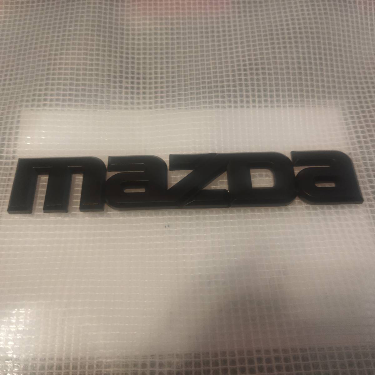 MAZDA(マツダ) エンブレム マットブラック 横14.4cm×縦2.7cm_画像1