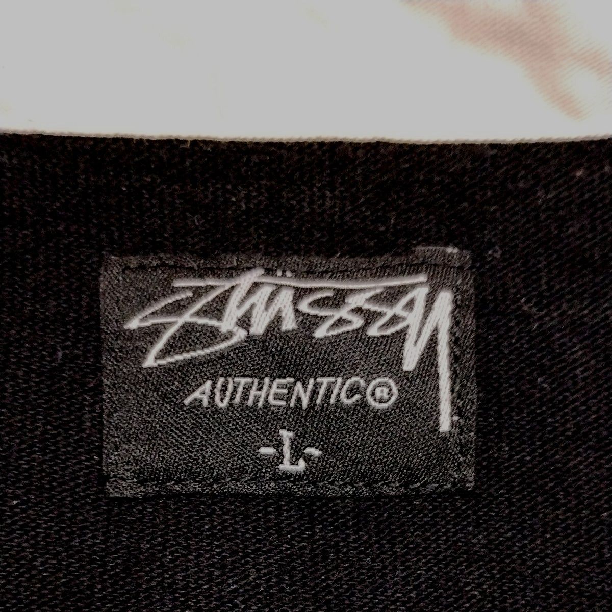 ステューシー半袖ポロシャツM/L　黒ボディに白衿　STUSSYロゴワッペン刺繍がカッコいい！　ラガーシャツ　やや厚手コットン100