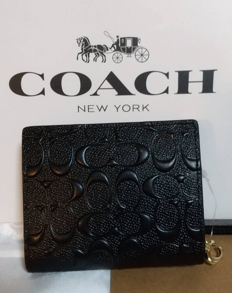 【 TOD's 】本革 ロゴエンボス加工二つ折り財布 COACH【新品】二つ折り財布エンボス加工