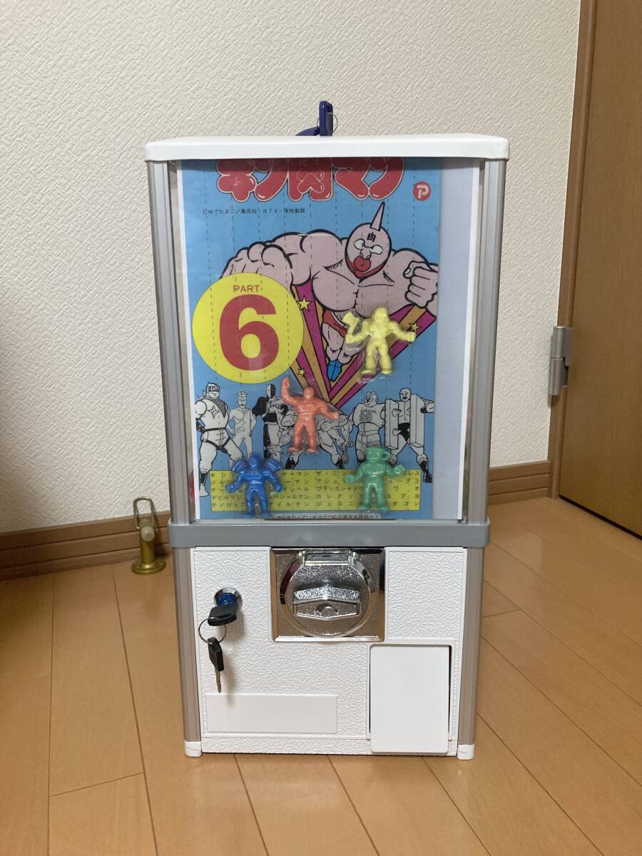 ガチャガチャ 本体セット 美品 コスモス キン肉マン景品 キン肉マン台紙 鍵 カプセル フルセット ガチャ レトロ キン消し 昭和の画像1