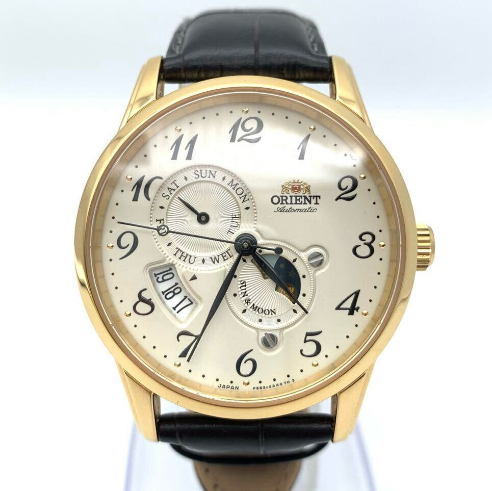 [ beautiful goods ] ORIENT Orient sun & moon F6B2-UAA0 B880342 self-winding watch day date wristwatch Gold color 