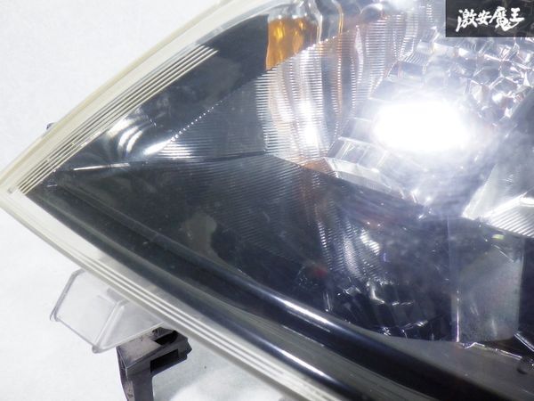 即納 点灯OK 破損なし トヨタ 純正 NCP141 140系 スペイド 前期 HID ヘッドライト ヘッドランプ 左 左側 助手席 刻印:B5 KOITO 52-261_画像3