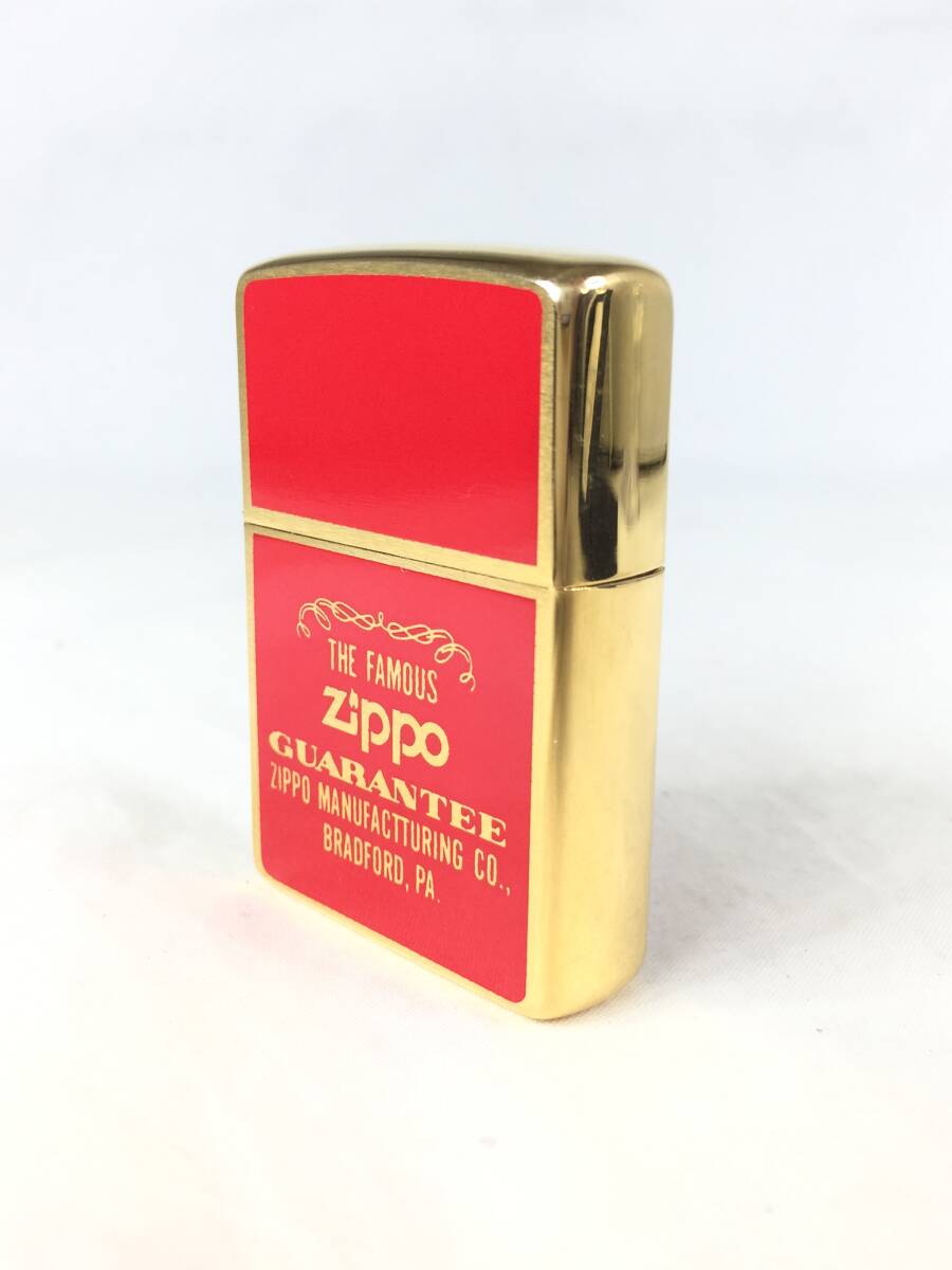 【ジャンク品】ZIPPO THE FAMOUS GUARANTEE レッド×ゴールド ケース付き 着火未確認 ※長期保管品 ジッポ ライター オイルライターの画像2