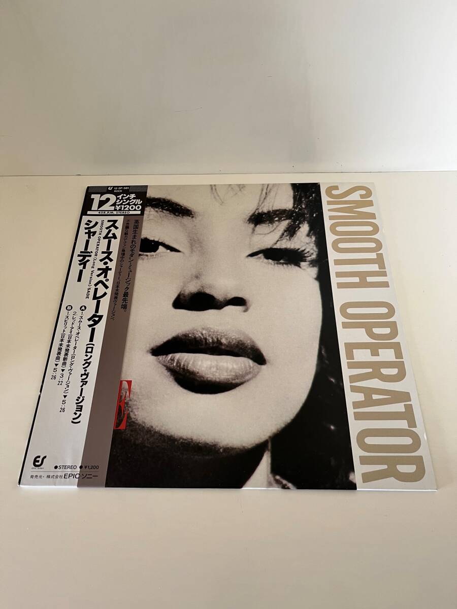 【12インチ】【'84 帯付国内盤】SADE (シャーデー) / SMOOTH OPERATOR (LONG VERSION)の画像1