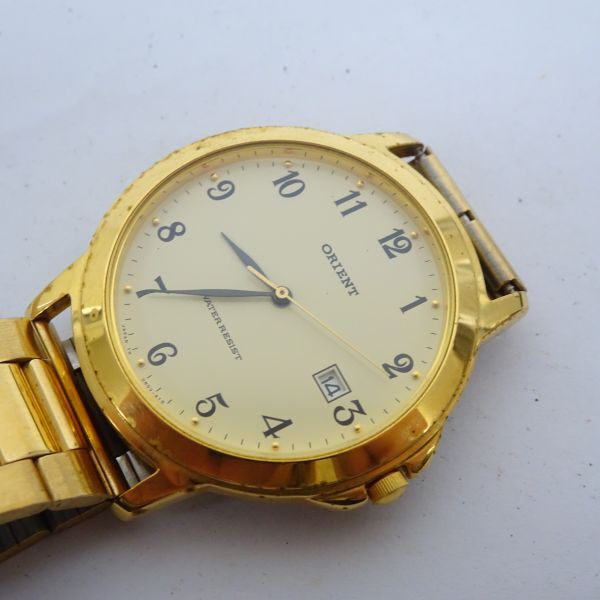♪tykh 1269-1 205 稼働品 ORIENT オリエント unov-a1 クオーツ メンズ腕時計 ゴールドカラーの画像2