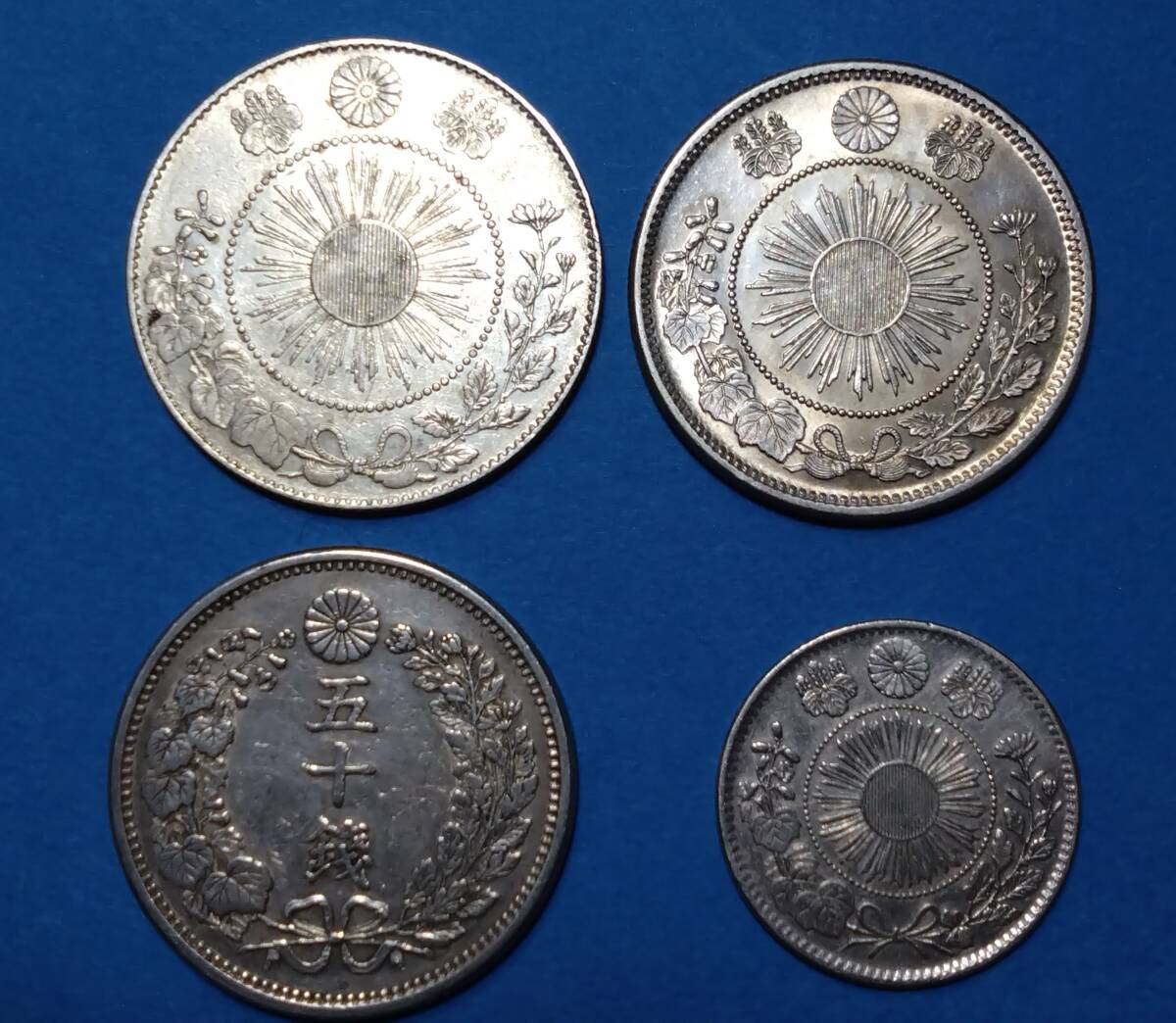  asahi day dragon large silver coin Meiji 4 year latter term molasses leaf . watch stem upper part ream point * asahi day dragon small size silver coin Meiji 4 year * dragon 50 sen silver coin Meiji 6 year missing . branch * asahi day dragon 20 sen silver coin Meiji 4 year missing sen 