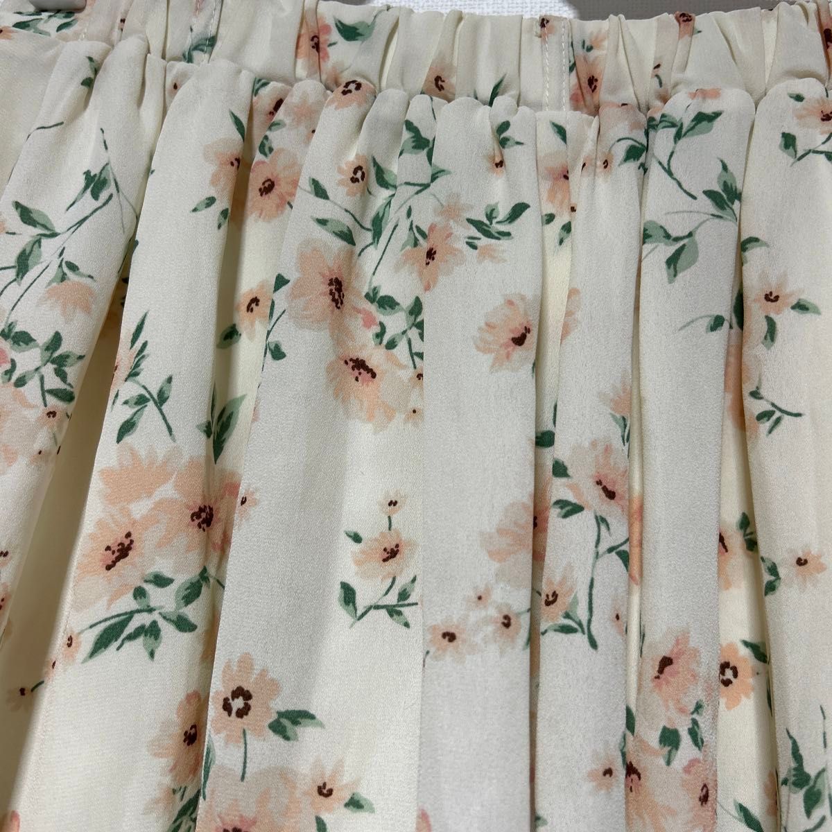 (S 150-160サイズ)キッズ スカートパンツ 短パンスカート 花柄 総柄 ミニ丈 フラワー イージー ホワイト マルチカラー