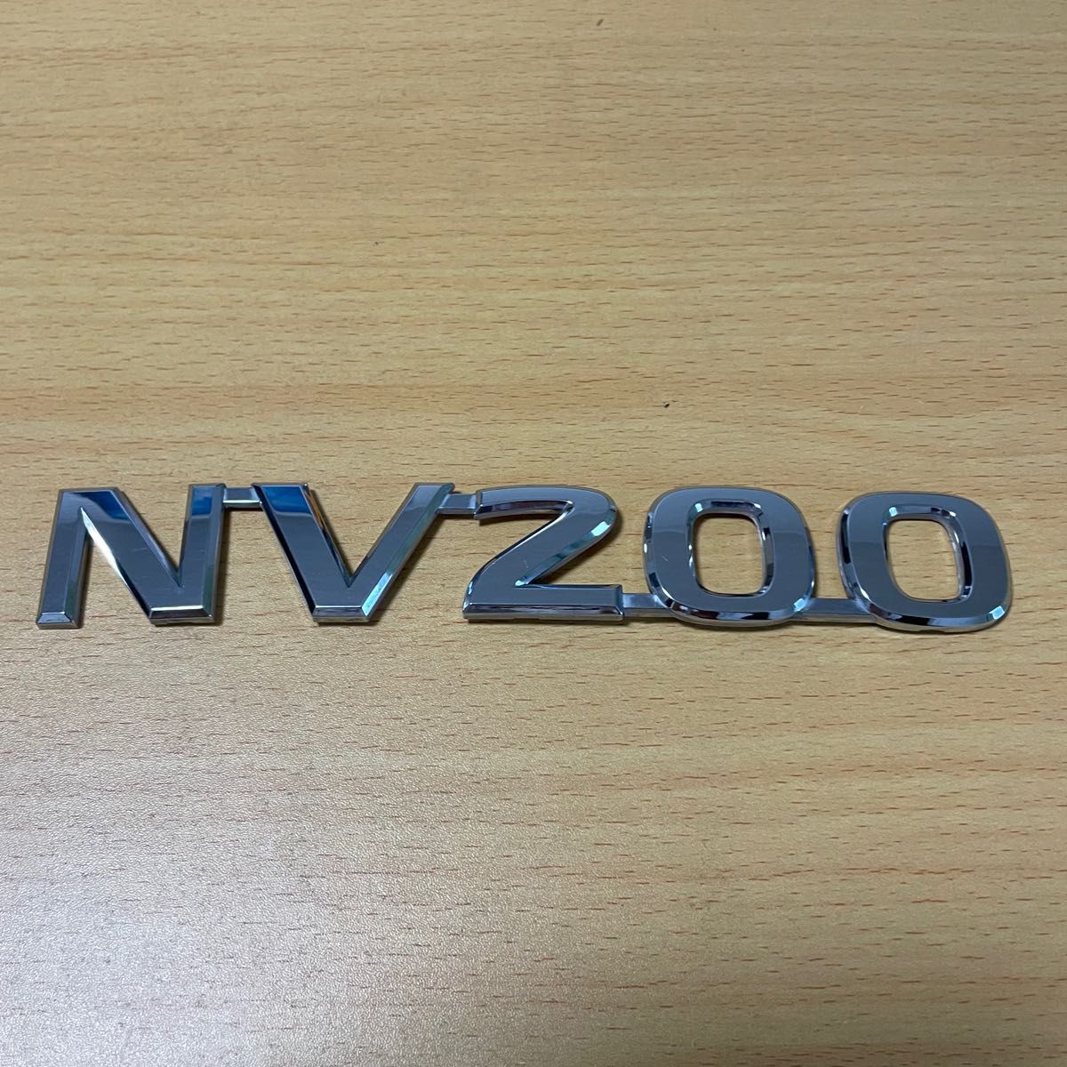 日産　NV200 バネット(VM20)　バックドア部のエンブレム　約 【186－28】mm