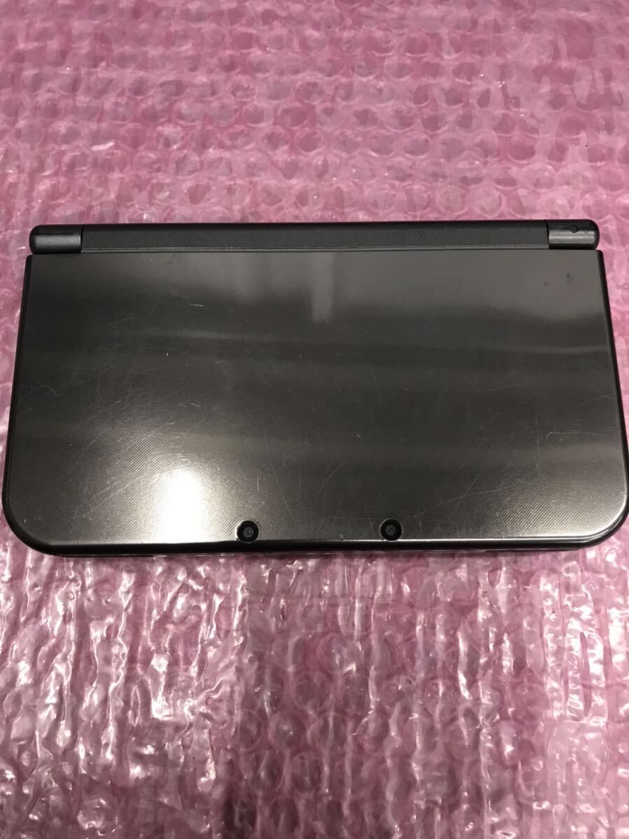 new Nintendo 3DSLL 初期化済み 液晶破損表示不良　中古現状品　ジャンク　(60s) B_画像1