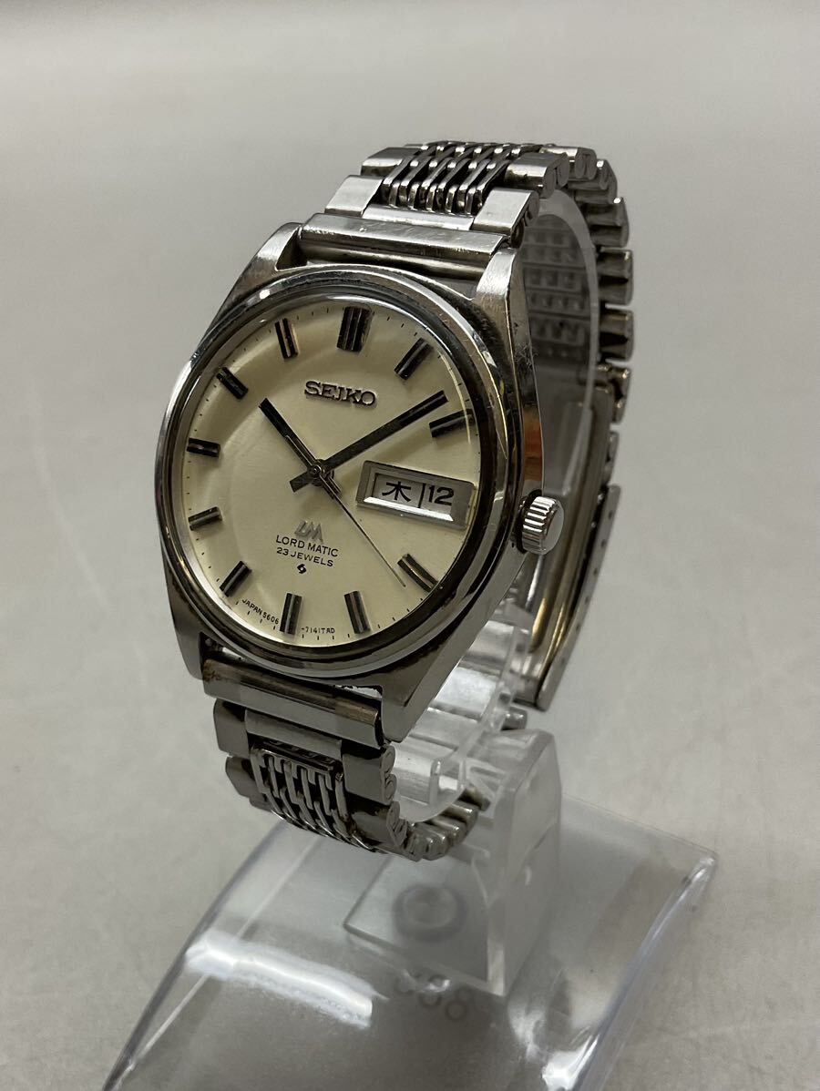 13 ジャンク SEIKO セイコー 5606-7040 LM ロードマチック 23JEWELS シルバー文字盤 デイデイト 自動巻き メンズ 腕時計の画像1