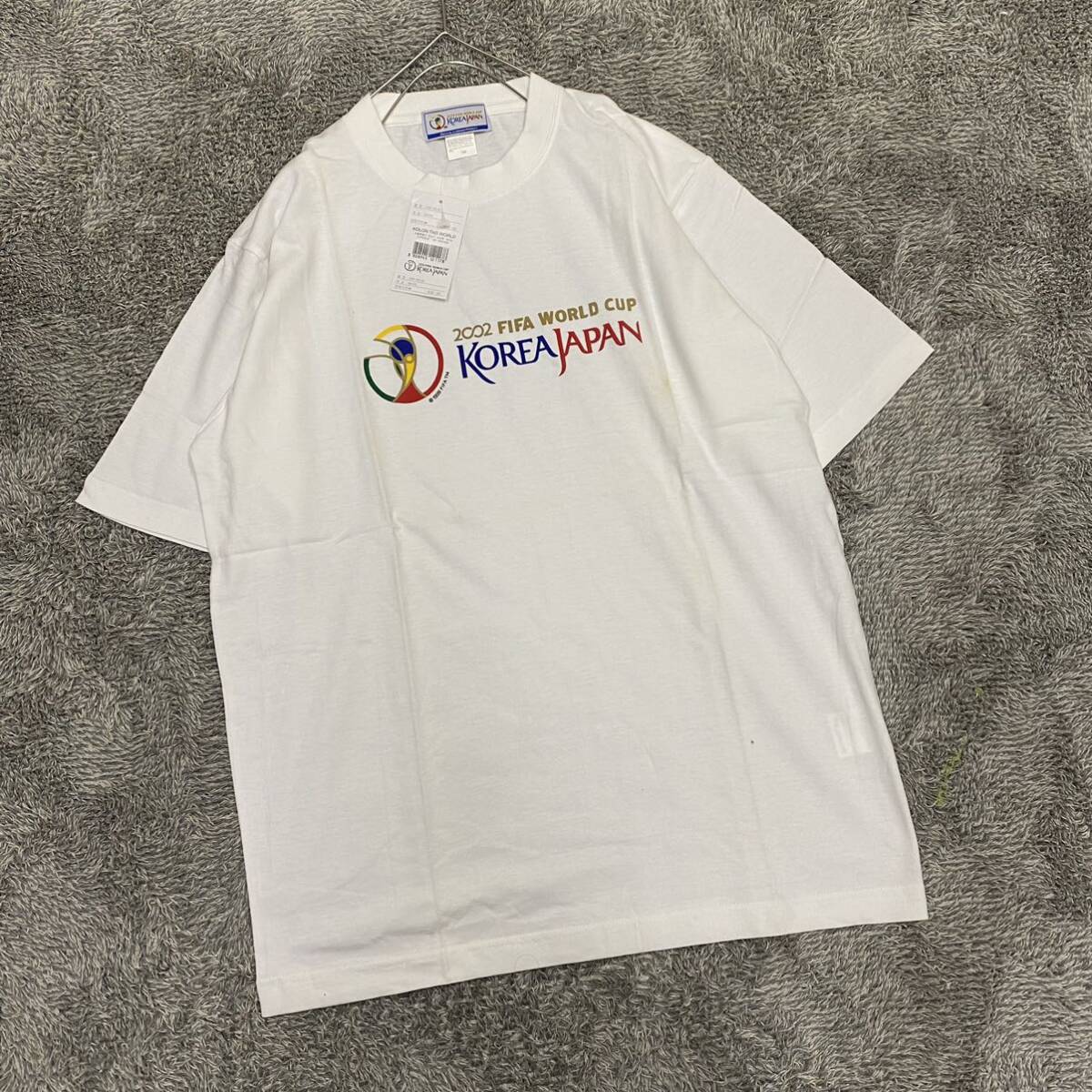 新品未使用 タグ付き FIFA WORLD CUP KOREA JAPAN Tシャツ 半袖カットソー ホワイト 白 メンズ トップス 最落なし （K19）_画像1